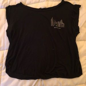 Black loose fitted top with ‘Brooklyn view’ detail